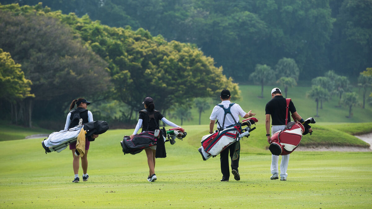 Golfers walking